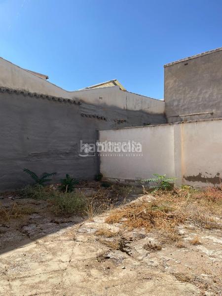 Foto fca7bf68-1cf1-4685-806c-3b2fb8eaa4fb. Casa aparellada a Tomelloso