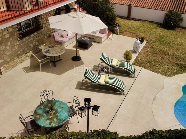 Foto 71e581c3-6bff-4b04-923f-85bb0cf3feed. Xalet amb xemeneia aparcament piscina a Mijas pueblo Mijas