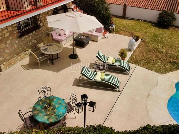 Foto d03af2ea-e5be-40a7-89bd-3cb4c51ae533. Xalet amb xemeneia aparcament piscina a Mijas pueblo Mijas