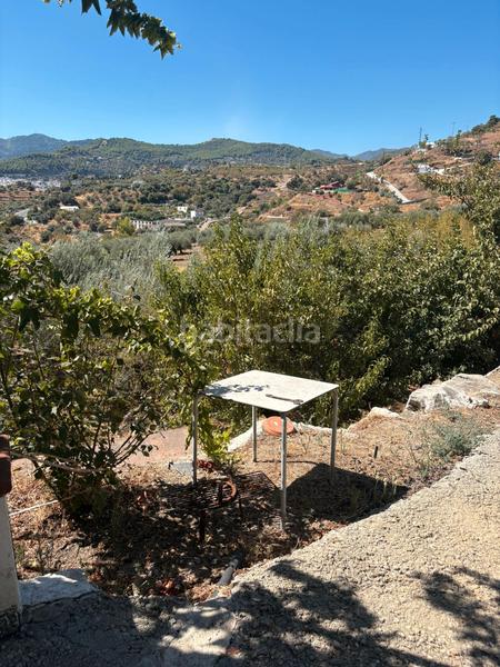 Foto e6488167-7a1f-4c73-aae3-ef424c13ade1. Bauernhof mit parking in Guaro