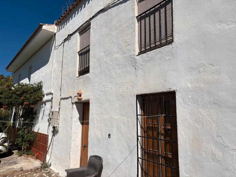 Foto f1522229-29d3-4175-9182-9dbae1a1ac57. Bauernhof mit parking in Guaro