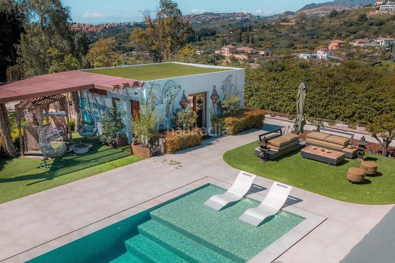 Foto 7b7193b9-f137-4a0d-bec2-f13840a3a958. Casa aparellada amb aparcament a La Quinta Benahavís