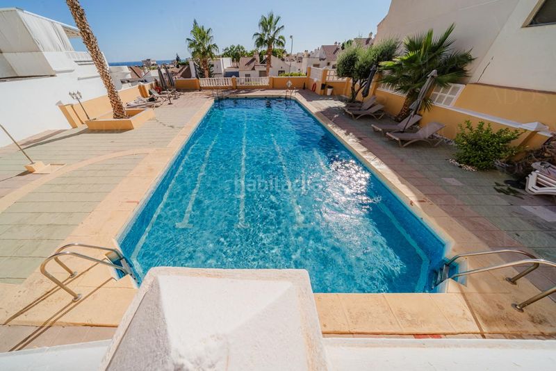 Foto 3d246053-cfd2-4e66-804a-56af26aef16c. Casa adossada amb aparcament piscina a Aguadulce Norte Roquetas de Mar