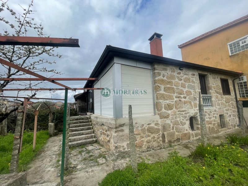 Foto 2c4303da-54d7-4f9c-b05b-7c7fd0230cc7. Casa amb calefacció aparcament a Mariñamansa Ourense