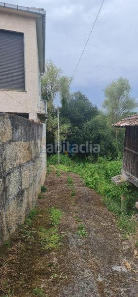 Foto 4d1c7eca-1d72-49b1-b86f-f59ee17e0202. Haus mit heizung parking in Toén