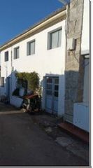 Casa adossada a Buslad