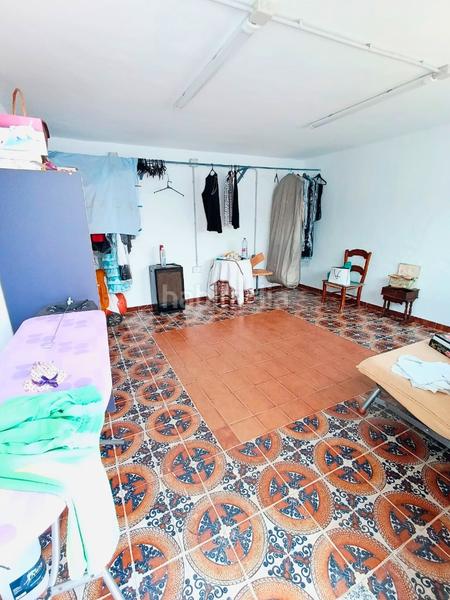 Foto a64183d4-6bee-4715-a32d-b65bec16b806. Casa aparellada amb xemeneia calefacció aparcament a Mollina