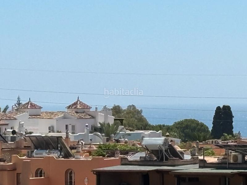 Foto 4a9c2301-d3e6-4902-94fe-8538a23ffde1. Casa pareada casa con piscina a reformar en Nagüeles Alto Marbella