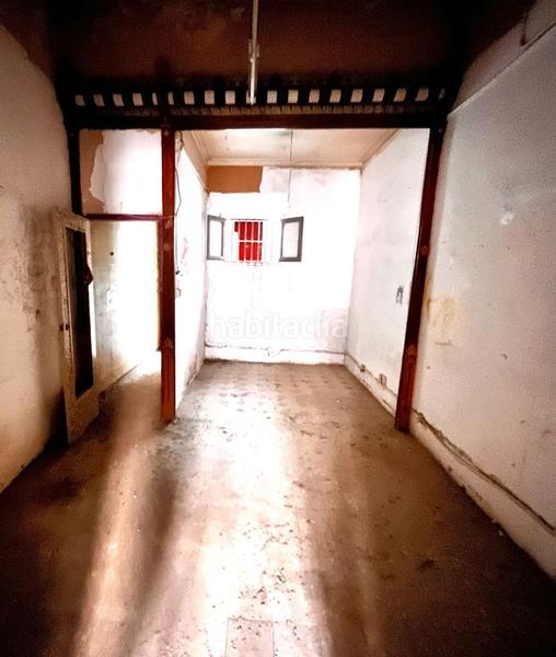 Foto 22453372-1e60-48a0-beb9-ffb6e92d7a26. Casa adosada casa en venta totalmente a reformar en Barcelona