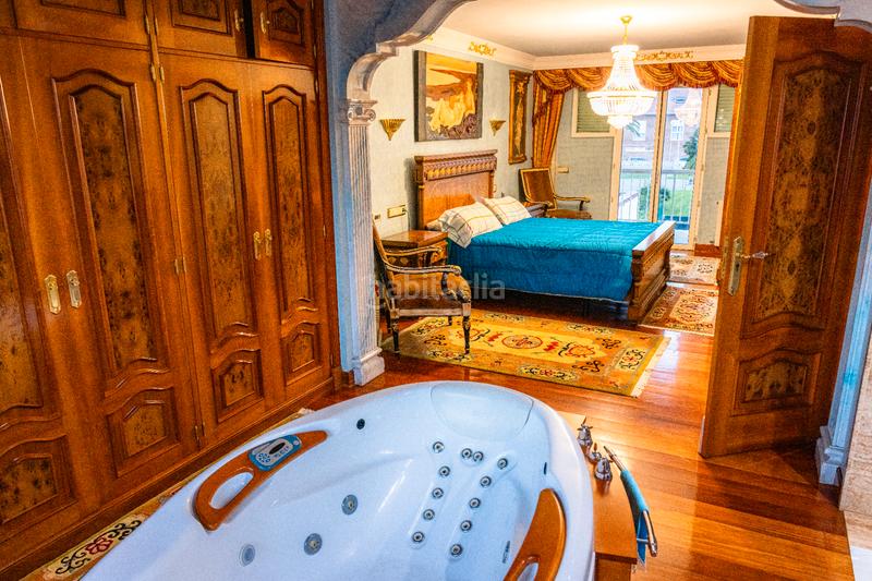 Foto 5b103085-5345-48d3-9c3b-caee43dada8c. Casa aparellada amb xemeneia calefacció aparcament piscina a Santa Cruz de Bezana