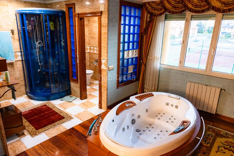 Foto 6f16bf41-1b6f-4783-9f01-3003ec40792a. Casa aparellada amb xemeneia calefacció aparcament piscina a Santa Cruz de Bezana