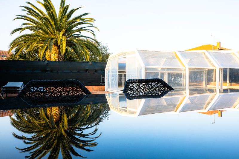 Foto 9c10aea0-6d31-4108-b890-8afbc3e67f7c. Casa aparellada amb xemeneia calefacció aparcament piscina a Santa Cruz de Bezana