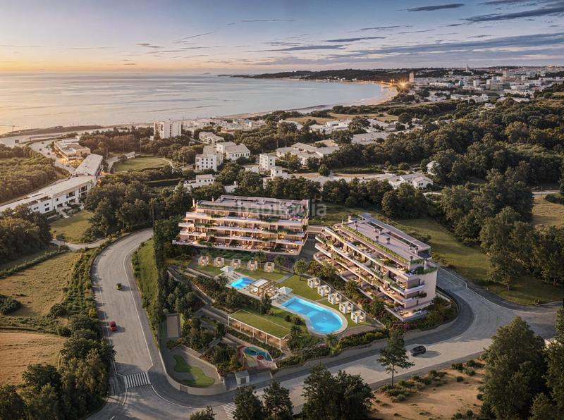 Foto 667084f1-196e-4b88-ba5b-8e655dfb28f5. Flat with parking pool in El Faro de Calaburra - Chaparral Mijas