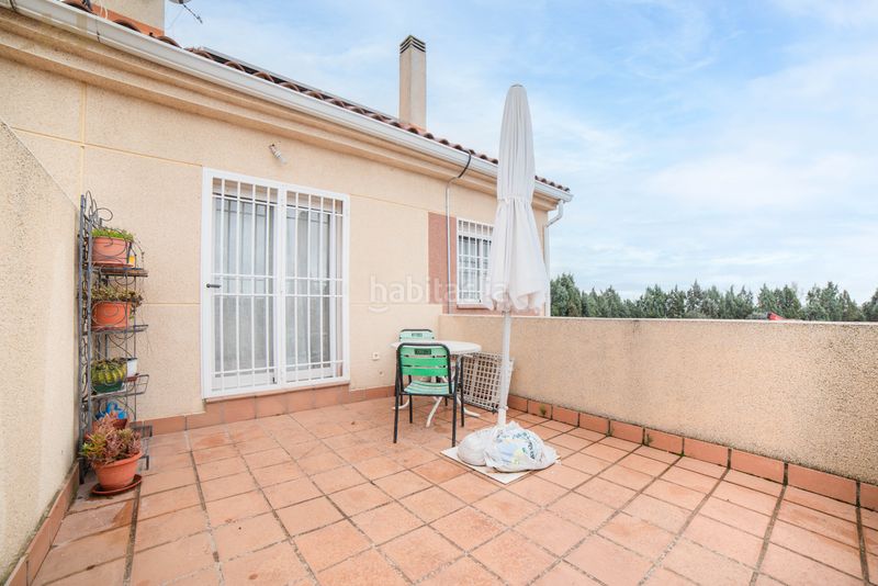 Foto 76e809a0-b440-4ee9-90ce-f36fa1eef5b8. Casa aparellada amb calefacció aparcament a Las Lomas Seseña