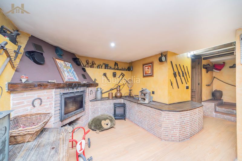 Foto d988d1c2-5dd8-49fd-b7b2-3e2395640a95. Casa aparellada amb xemeneia calefacció aparcament piscina a Valdemoro
