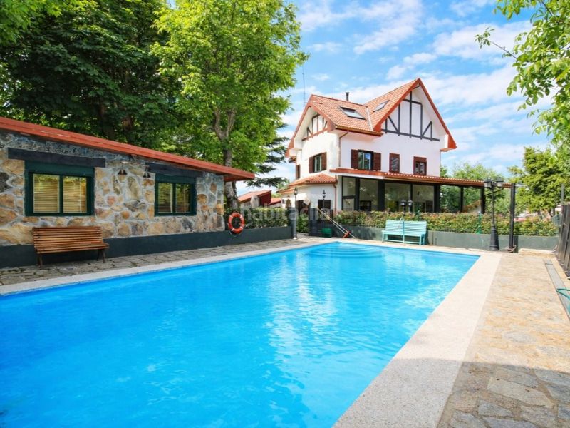 Foto b08e376b-18b9-4e2d-8748-178514bc9097. Xalet amb aparcament piscina a Cercedilla
