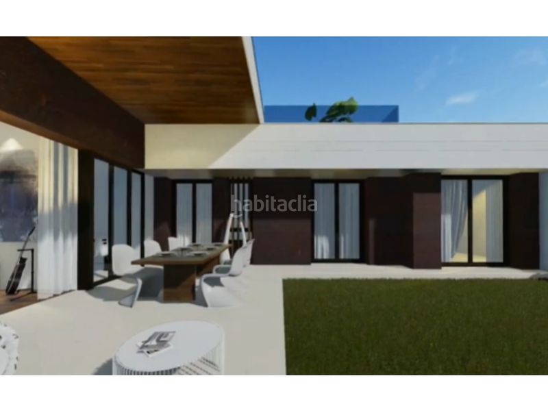 Foto f56bbcc2-b587-4895-8ded-3e772563a5e1. Casa adossada amb aparcament a El Olivar de Mirabal Boadilla del Monte