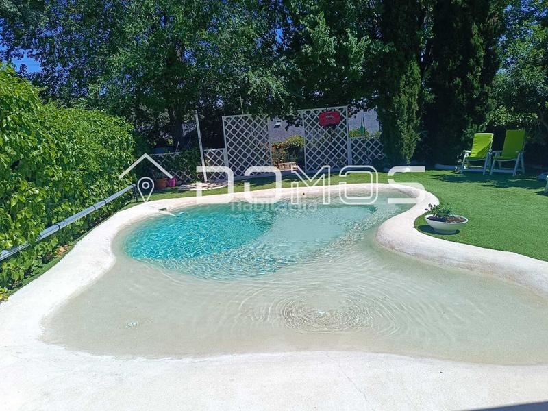 Foto 9df2b9a2-39ec-429e-a24e-72c1abb6bfed. Casa chalet pareado único con piscina climatizada en Guadarrama