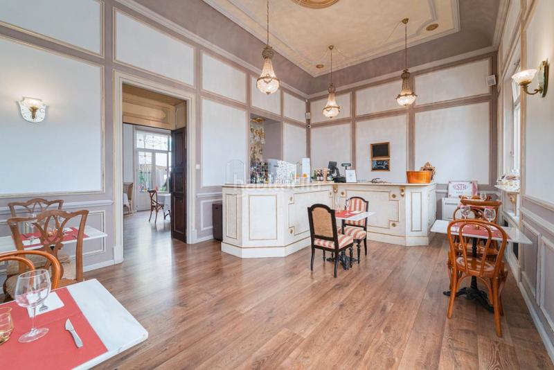 Foto d56301c2-2b5c-46bd-b477-e7c6f141c44c. Casa pareada casa adosada modernista con restaurante en venta , mallorca en Sóller