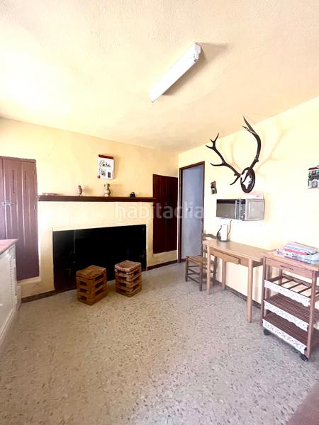 Foto 1bb3ab4e-f90a-4cdb-8398-c80d8ce30864. Casa adossada amb xemeneia a Almonaster la Real