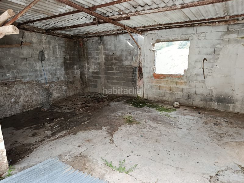 Foto eb9a5275-0b56-42cb-bd6e-07672fb4c3c1. Casa adossada amb xemeneia a Iznalloz
