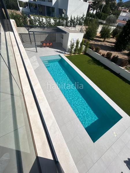 Foto c0ee9a7c-c2c4-4c88-a798-9adfd7ff11a5. Chalet with heating parking pool in El Montgó Dénia