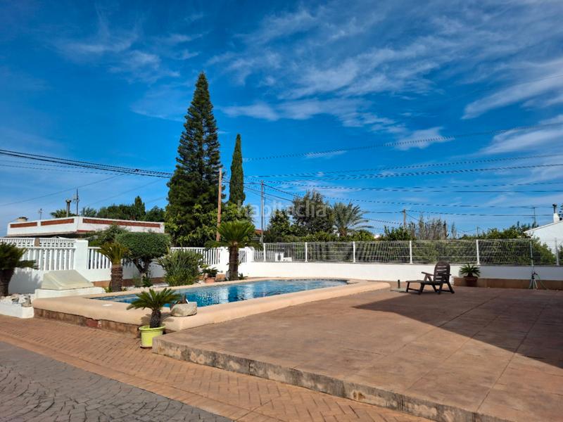 Foto 9a78359f-1adb-484a-a1b3-c782235ac4db. Chalet mit heizung parking pool in Oliva playa Oliva