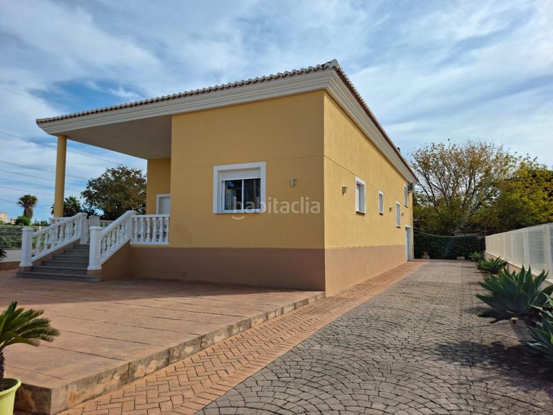 Foto ccd656bb-7d12-4eba-94cf-2d1ebea0e505. Chalet en Oliva playa Oliva