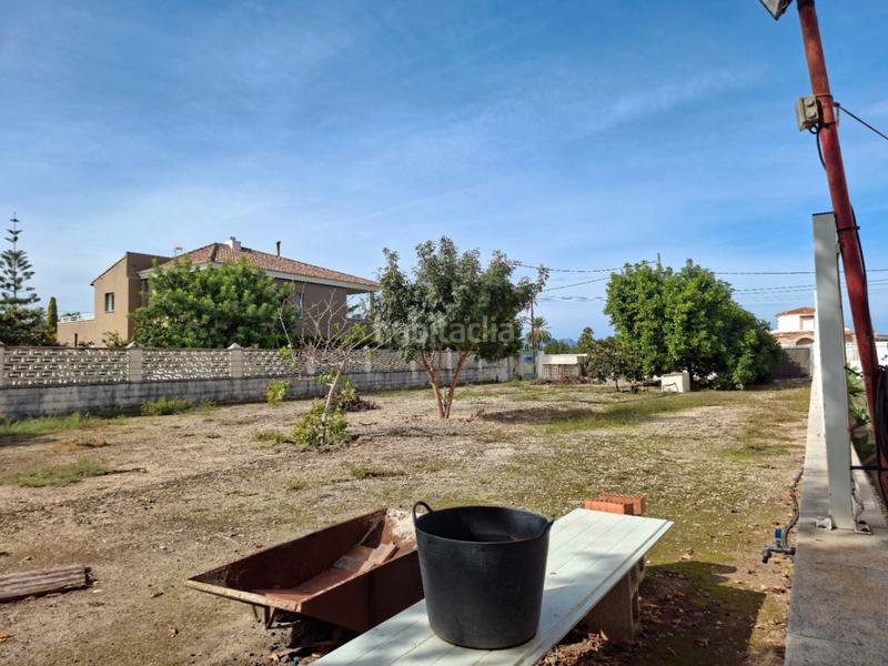 Foto f03159b9-2c1b-4a79-8de0-c4a8cc2998fc. Chalet con riscaldamento parcheggio piscina in Oliva playa Oliva