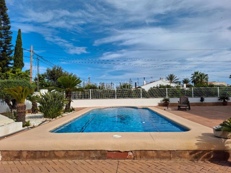 Foto fe1c3a16-1277-4a0d-a633-5eda01045103. Xalet amb calefacció aparcament piscina a Oliva playa Oliva