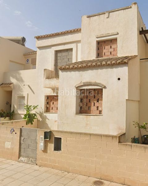 Foto fd075e71-7d2c-433c-85d7-242bd501ba7f. Casa adossada amb aparcament a Almerimar Ejido (El)
