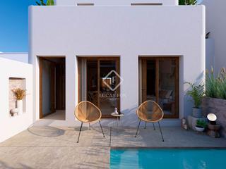 Chalet in Playa del Puig. Casa adosada de estilo mediterráneo con piscina privada en venta