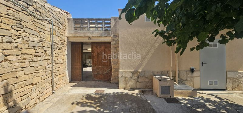 Foto a0419edf-8e96-4a55-a90b-a99f6f393e22. Casa aparellada amb aparcament a Barberà de la Conca