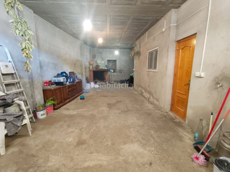 Foto bd2b3bb3-3cfb-42a6-90a5-82a20faa5e40. Casa aparellada amb xemeneia aparcament a Marchal