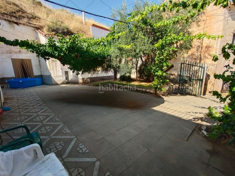 Foto 723f84dd-65c8-465d-b7ce-e71548d25ca0. Casa amb xemeneia aparcament a Guadix