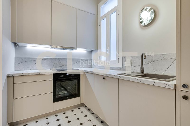 Foto 15f8f192-65f7-4a31-8c11-2573d3c3c9f7. Apartament amb xemeneia calefacció a Dreta de l´Eixample Barcelona