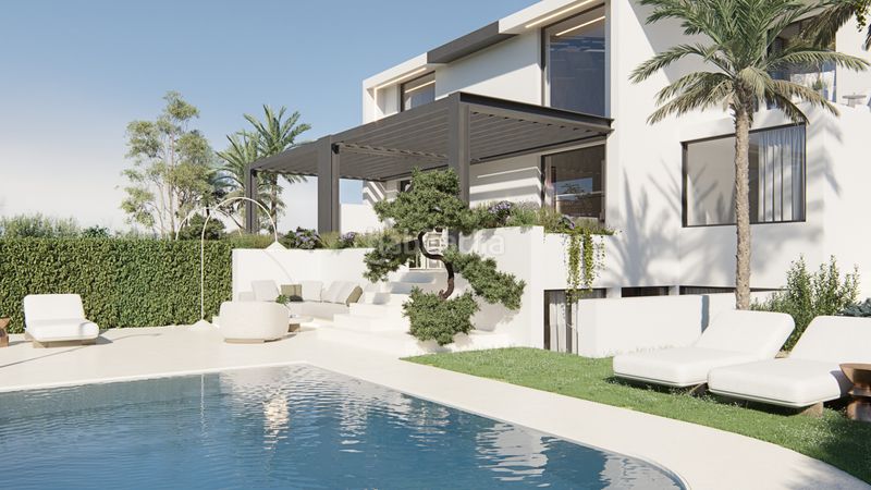 Foto 007438da-1a72-4987-9198-5436f3c093fc. Towny house in paseo del golf 11x in Islantilla golf Islantilla
