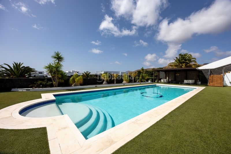 Foto e7d889fc-eb86-40a0-8019-be510b5b3653. Casa en Punta Calero Yaiza