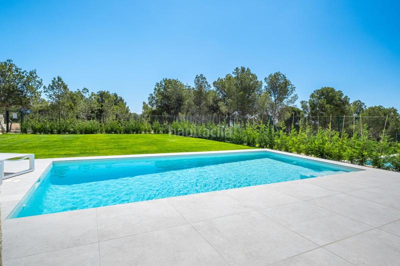 Foto 39251aa6-d987-47d5-881a-b30ac4599447. Chalet avec parking piscine dans Golf Bahía Finestrat