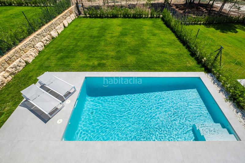 Foto 569e8260-ceb2-4d5b-97f7-5d19625bf5bb. Chalet avec parking piscine dans Golf Bahía Finestrat