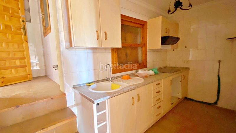 Foto a6b8a758-32ff-4e0b-bfdb-a31b212fe5f2. Casa adossada amb aparcament a Aledo
