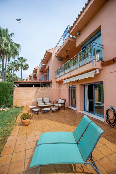 Foto 89921a0c-9b1e-4415-ae11-44ed0986fc87. Casa aparellada amb aparcament piscina a Los Naranjos Marbella