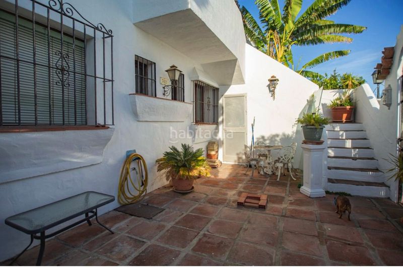 Foto 1a1927ce-757f-41e9-8f1f-cfc50c749184. Casa aparellada amb aparcament piscina a Valdeolletas - Las Cancelas - Xarblanca Marbella