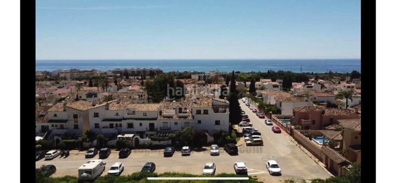 Foto eea5800f-7aa5-4715-9e2c-a9c00faf0be7. Casa aparellada amb aparcament piscina a Valdeolletas - Las Cancelas - Xarblanca Marbella