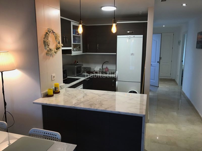 Foto 879cb547-4a26-494f-a144-c11436639194. Apartament amb aparcament piscina a Alcorrín Manilva