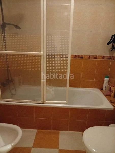 Foto 28465127-4a47-46c9-939e-7b5eda8254bb. Casa aparellada amb aparcament piscina a Alcorrín Manilva