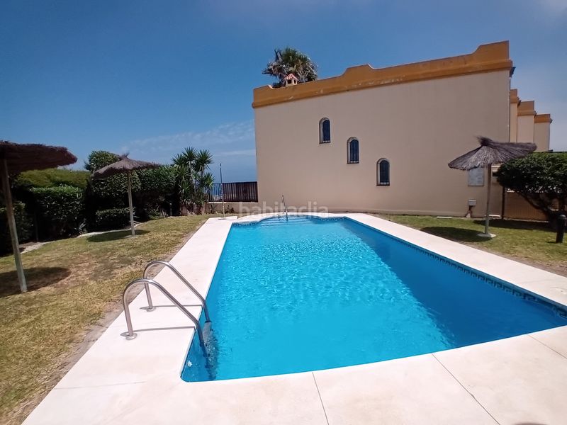 Foto 578c6683-d5b0-4dfc-9906-2d6135592392. Casa aparellada amb aparcament piscina a Manilva pueblo Manilva