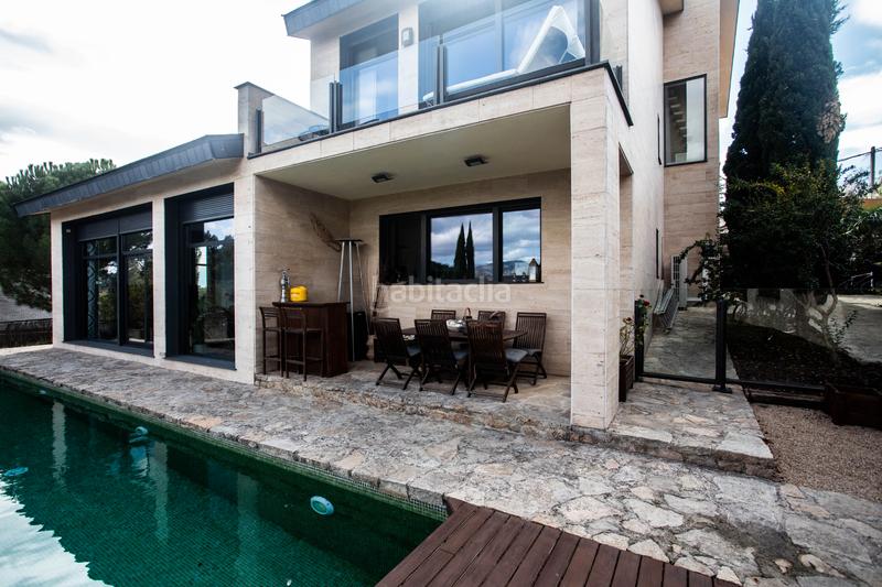 Foto b7a06d08-0b19-4e70-92b0-9437289cc3a9. Chalet avec cheminée chauffage parking piscine dans Galapagar