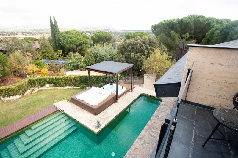 Foto b9b0f995-c6aa-45d1-a92f-e697fce22fbb. Chalet avec cheminée chauffage parking piscine dans Galapagar