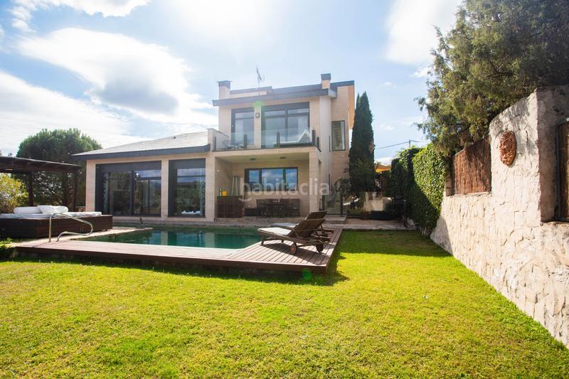 Foto c3c33f55-5d17-401f-add2-6b697bfcf974. Chalet avec cheminée chauffage parking piscine dans Galapagar